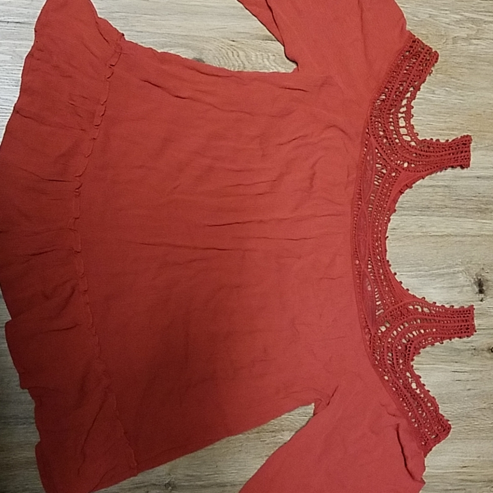 Maurice's rust colored blouse